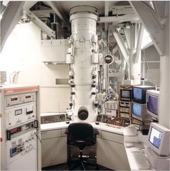 The JEOL ARM 1250 was designed to maximize image resolution through the use of a high accelerating voltage. It has a LaB6 source that can be operated at an accelerating voltage of up to 1250 kV. The large size of the components required to support this voltage mean this TEM takes up two storeys, which is a factor in the rarity of instruments with this design. This TEM is suitable for in-situ experiments with a video system installed and an incorporated drift-correction system.