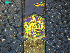 Central hexagon with vivid, swirling colors, bordered by cracked textures and scattered diamond-like forms on a dark surface.
Optical micrograph of a test sample used for the development of integrated liquid solid heterostructures. Advanced Materials 30, 1802598 (2018)