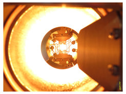 Photograph of a hot tungsten filament designed for a thermoelectronic generator (Alex Kyriazis).