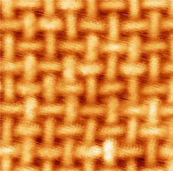This scanning tunnelling microscopy image shows how iron atoms and organic molecules become ordered in patterns on a gold substrate.