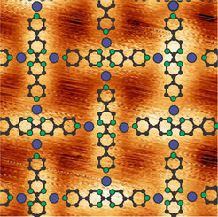 The iron atoms (blue) and the organic molecules (green, black) form a lattice pattern on the gold substrate.
